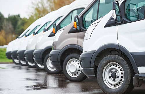 fleet of vehicles in parking lot