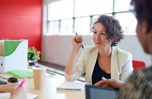 Business woman at her desk