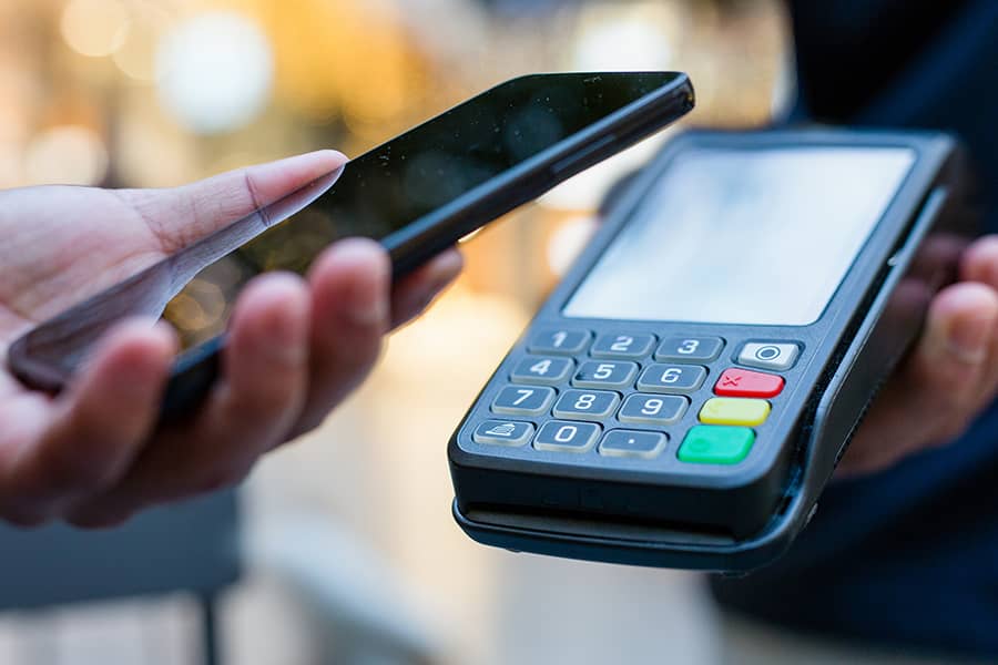 Paying with a phone and a handheld terminal