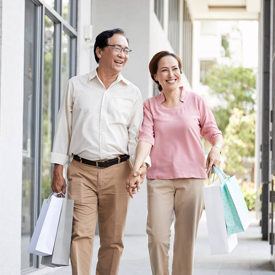 An older couple out shopping