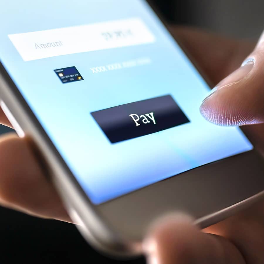 Closeup of mobile phone screen with PAY button