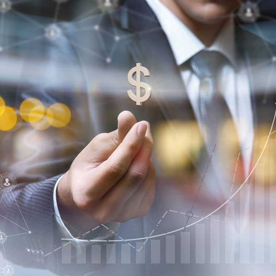 Concept of a business man holding a dollar sign